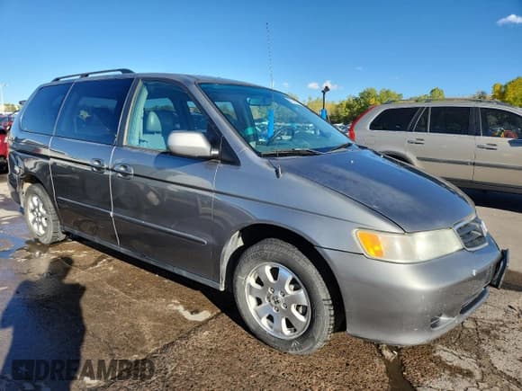 ✅ 2002 Honda Odyssey EX-L • VIN: 2HKRL18912H540373 • Лот: 85757615. Опубликован ранее на Copart с пробегом 227 720 миль. Бесплатный доступ к архиву аукционных продаж из США и подробный отчёт об истории автомобиля на DreamBid. Изображение 4.