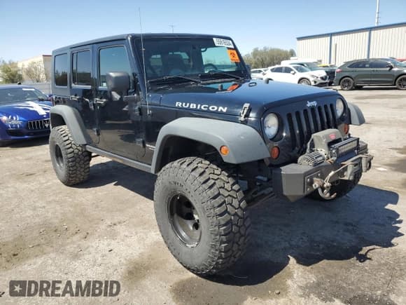 ✅ 2008 Jeep Wrangler Rubicon • VIN: 1J8GA69158L563252 • Lot: 55816534. Listed on Copart with 166,644 mi. Free auction sales archive from the USA and detailed vehicle history report at DreamBid. Image 4.