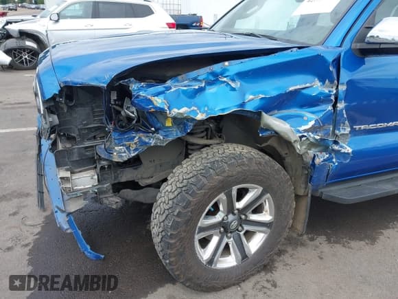 ✅ 2016 Toyota Tacoma Limited • VIN: 3TMGZ5AN1GM030563 • Lot: 42577215. Listed on IAAI with 100,917 mi. Free auction sales archive from the USA and detailed vehicle history report at DreamBid. Image 6.