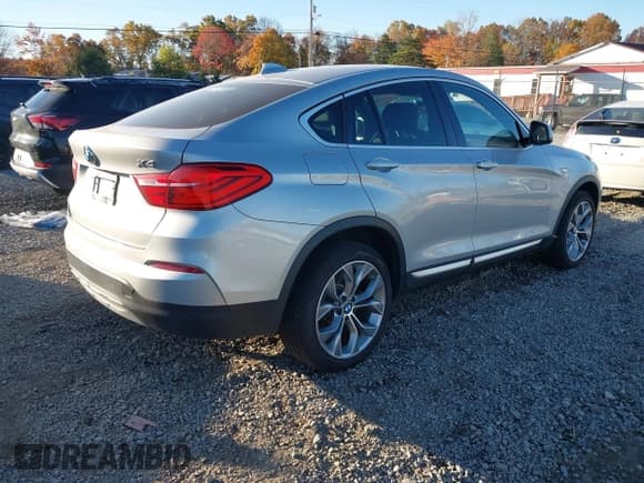 ✅ 2018 BMW X4 xDrive28i • VIN: 5UXXW3C55J0T82452 • Lot: 43468276. Listed on IAAI with 56,711 mi. Free auction sales archive from the USA and detailed vehicle history report at DreamBid. Image 4.