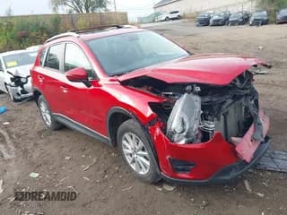✅ 2016 Mazda CX-5 Touring • VIN: JM3KE4CY9G0663412 • Lot: 43458762. Wystawiony na IAAI z przebiegiem 101 452 mil. Bezpłatny archiwum sprzedaży aukcyjnych z USA i szczegółowy raport historii pojazdu na DreamBid. Zdjęcie 1.