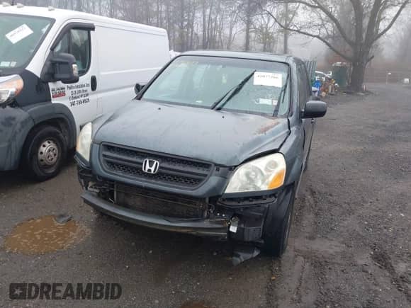 2003 Honda Pilot LX with VIN 2HKYF181X3H610581, listed as a IAAI auction lot 41743077 with 212,207 mi miles and . Bid and sale history available at DreamBid. Image 6.