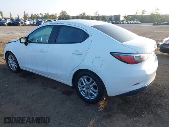 ✅ 2016 Scion iA • VIN: 3MYDLBZV7GY127767 • Лот: 43357664. Опубликован ранее на IAAI с пробегом 83 018 миль. Бесплатный доступ к архиву аукционных продаж из США и подробный отчёт об истории автомобиля на DreamBid. Изображение 3.