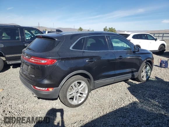 ✅ 2015 Lincoln MKC • VIN: 5LMTJ2AH6FUJ06182 • Lot: 90999195. Wystawiony na Copart z przebiegiem 89 880 mil. Bezpłatny archiwum sprzedaży aukcyjnych z USA i szczegółowy raport historii pojazdu na DreamBid. Zdjęcie 3.