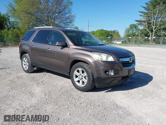 ✅ 2010 Saturn Outlook • VIN: 5GZLRUED3AJ200225 • Lot: 42038210. Wystawiony na IAAI z przebiegiem 174 469 mil. Bezpłatny archiwum sprzedaży aukcyjnych z USA i szczegółowy raport historii pojazdu na DreamBid. Zdjęcie 1.