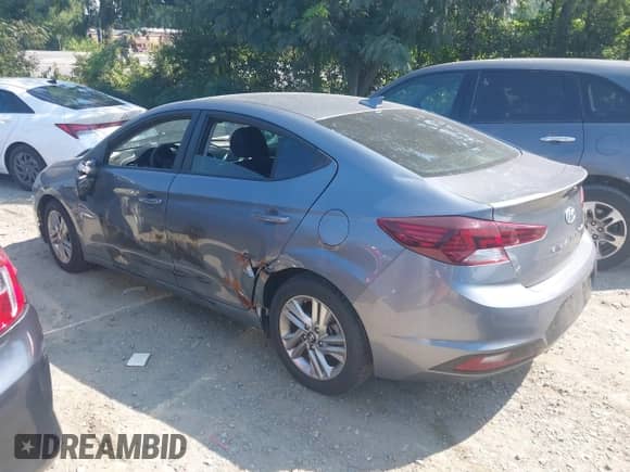 2019 Hyundai Elantra SEL z VIN KMHD84LF2KU800887, wystawiony jako IAAI lot #42996644 z przebiegiem 102 528 mil mil oraz . Historia ofert i sprzedaży dostępna na DreamBid. Obrazek 3.