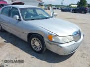 ✅ 1998 Lincoln Town Car Signature • VIN: 1LNFM82W1WY674095 • Lot: 42673161. Listed on IAAI with 150,245 mi. Free auction sales archive from the USA and detailed vehicle history report at DreamBid. Image 6.