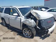 ✅ 2020 GMC Yukon Denali • VIN: 1GKS1CKJ5LR120779 • Lot: 41987696. Listed on IAAI with Not provided. Free auction sales archive from the USA and detailed vehicle history report at DreamBid. Image 1.