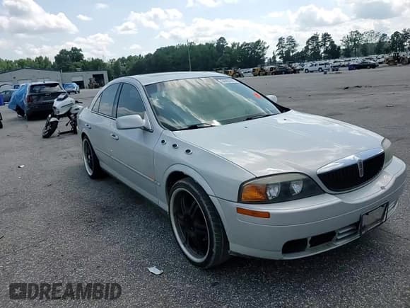 ✅ 2001 Lincoln LS • VIN: 1LNHM87AX1Y736723 • Лот: 64463665. Опубликован ранее на Copart с пробегом 150 533 миль. Бесплатный доступ к архиву аукционных продаж из США и подробный отчёт об истории автомобиля на DreamBid. Изображение 13.