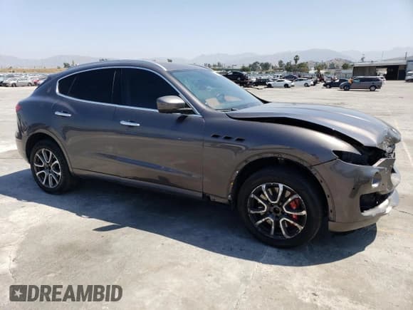 ✅ 2019 Maserati Levante S • VIN: ZN661YUAXKX313879 • Lot: 64864094. Listed on Copart with 52,115 mi. Free auction sales archive from the USA and detailed vehicle history report at DreamBid. Image 4.
