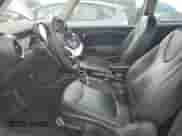 2012 MINI Hardtop with VIN WMWSU3C53CT260060, listed as a Copart auction lot 63656395 with 100,537 mi miles and Clean title. Bid and sale history available at DreamBid. Image 7.