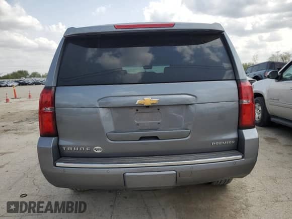 2020 Chevrolet Tahoe Premier with VIN 1GNSKCKC7LR125399, listed as a Copart auction lot 54702635 with 134,684 mi miles and Salvage title. Bid and sale history available at DreamBid. Image 6.