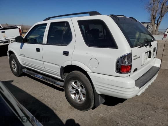 ✅ 2004 Isuzu Rodeo S • VIN: 4S2CK58YX44307841 • Lot: 46545285. Listed on Copart with 94,849 mi. Free auction sales archive from the USA and detailed vehicle history report at DreamBid. Image 2.