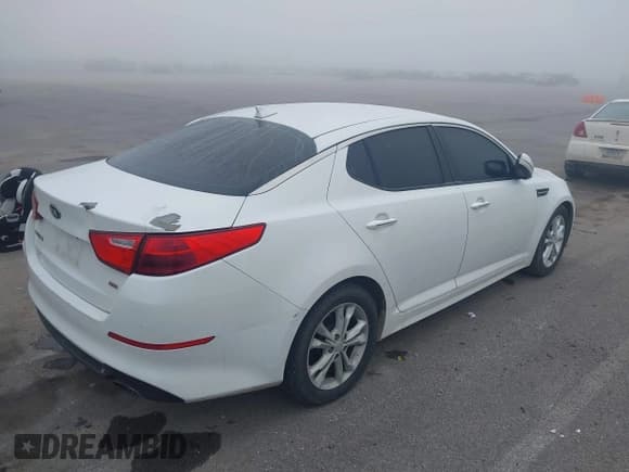 ✅ 2014 Kia Optima LX • VIN: 5XXGM4A71EG303834 • Lot: 42380350. Listed on IAAI with 148,359 mi. Free auction sales archive from the USA and detailed vehicle history report at DreamBid. Image 4.
