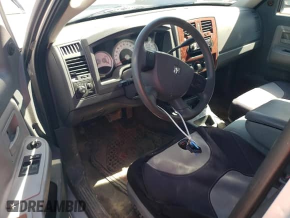 2005 Dodge Dakota SLT with VIN 1D7HW42N75S164042, listed as a Copart auction lot 57322854 with 184,609 mi miles and Salvage title. Bid and sale history available at DreamBid. Image 8.