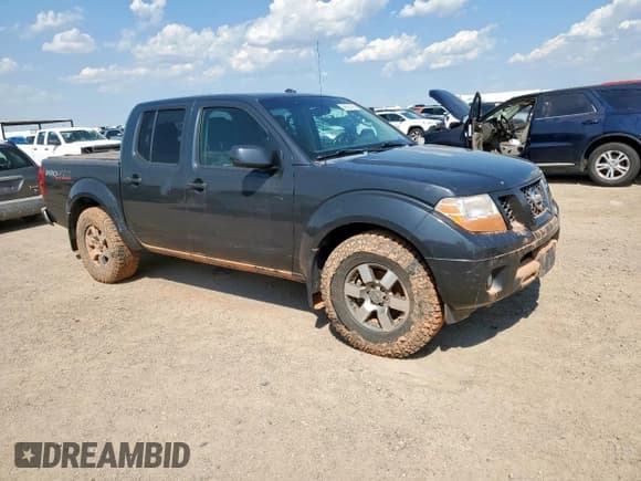 ✅ 2010 Nissan Frontier SE • VIN: 1N6AD0EVXAC409021 • Lot: 68933195. Listed on Copart with 202,371 mi. Free auction sales archive from the USA and detailed vehicle history report at DreamBid. Image 4.