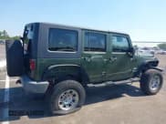 ✅ 2007 Jeep Wrangler Unlimited Sahara • VIN: 1J4GA59157L198095 • Lot: 43011519. Listed on IAAI with 198,022 mi. Free auction sales archive from the USA and detailed vehicle history report at DreamBid. Image 13.