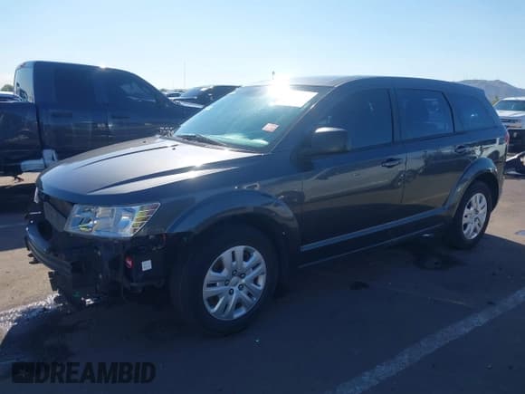 ✅ 2014 Dodge Journey SE • VIN: 3C4PDCAB5ET182518 • Lot: 43214035. Listed on IAAI with 125,020 mi. Free auction sales archive from the USA and detailed vehicle history report at DreamBid. Image 18.