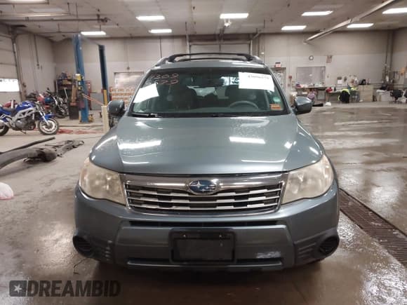 ✅ 2009 Subaru Forester X • VIN: JF2SH63639H719392 • Lot: 43096579. Listed on IAAI with 123,436 mi. Free auction sales archive from the USA and detailed vehicle history report at DreamBid. Image 12.