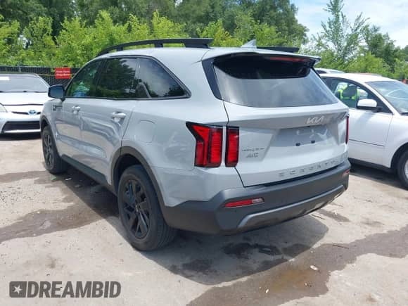 2022 Kia Sorento X-Line S z VIN 5XYRLDLC0NG095849, wystawiony jako IAAI lot #42663893 z przebiegiem 42 132 mil mil oraz . Historia ofert i sprzedaży dostępna na DreamBid. Obrazek 3.