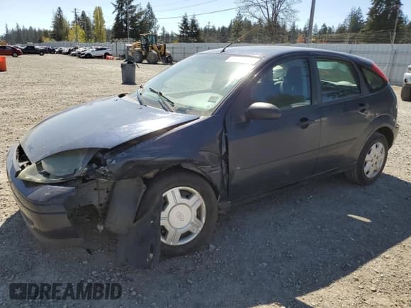 ✅ 2004 Ford Focus ZX5 • VIN: 3FAFP37354R114742 • Lot: 53533315. Listed on Copart with 383,279 mi. Free auction sales archive from the USA and detailed vehicle history report at DreamBid. Image 1.