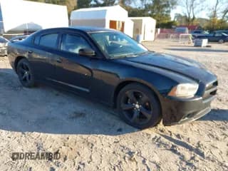 ✅ 2012 Dodge Charger SXT • VIN: 2C3CDXHG0CH185828 • Lot: 43452841. Listed on IAAI with 166,615 mi. Free auction sales archive from the USA and detailed vehicle history report at DreamBid. Image 1.