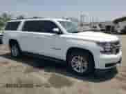 2019 Chevrolet Suburban LT with VIN 1GNSCHKCXKR207233, listed as a Copart auction lot 55410464 with 107,500 mi miles and Salvage title. Bid and sale history available at DreamBid. Image 4.