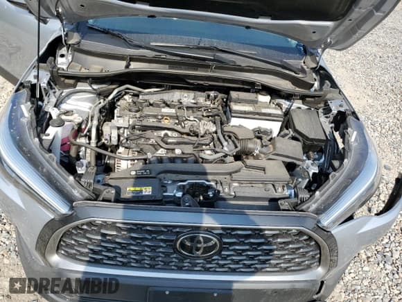 ✅ 2022 Toyota Corolla Cross XLE • VIN: 7MUDAABG9NV021017 • Lot: 66562555. Listed on Copart with 14,394 mi. Free auction sales archive from the USA and detailed vehicle history report at DreamBid. Image 12.