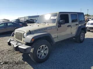 ✅ 2017 Jeep Wrangler Unlimited Rubicon Hard Rock • VIN: 1C4BJWFG5HL657299 • Lot: 71273355. Listed on Copart with 115,162 mi. Free auction sales archive from the USA and detailed vehicle history report at DreamBid. Image 1.