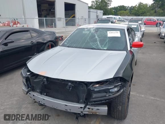 ✅ 2023 Dodge Charger SXT • VIN: 2C3CDXBG4PH508762 • Lot: 43052768. Listed on IAAI with 39,616 mi. Free auction sales archive from the USA and detailed vehicle history report at DreamBid. Image 6.
