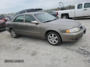 ✅ 2002 Mazda 626 LX • VIN: 1YVGF22D225285499 • Lot: 53693055. Listed on Copart with 144,812 mi. Free auction sales archive from the USA and detailed vehicle history report at DreamBid. Image 4.