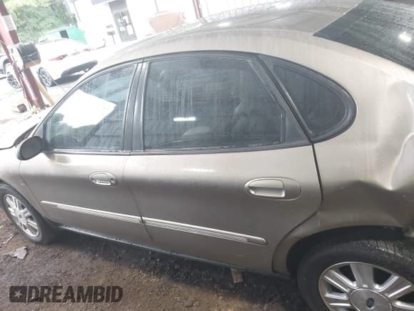 ✅ 2004 Ford Taurus SEL • VIN: 1FAFP56S34A134051 • Lot: 43245056. Listed on IAAI with 197,425 mi. Free auction sales archive from the USA and detailed vehicle history report at DreamBid. Image 14.