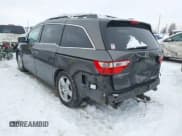 ✅ 2012 Honda Odyssey Touring • VIN: 5FNRL5H95CB049148 • Lot: 43831103. Listed on IAAI with 288,928 mi. Free auction sales archive from the USA and detailed vehicle history report at DreamBid. Image 3.