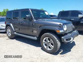 ✅ 2021 Jeep Wrangler Unlimited Sahara • VIN: 1C4HJXEN3MW592235 • Lot: 42690167. Listed on IAAI with 103,351 mi. Free auction sales archive from the USA and detailed vehicle history report at DreamBid. Image 1.