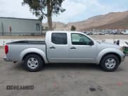 ✅ 2006 Nissan Frontier SE • VIN: 1N6AD07U56C459398 • Лот: 42756580. Опубликован ранее на IAAI с пробегом 145 988 миль. Бесплатный доступ к архиву аукционных продаж из США и подробный отчёт об истории автомобиля на DreamBid. Изображение 13.