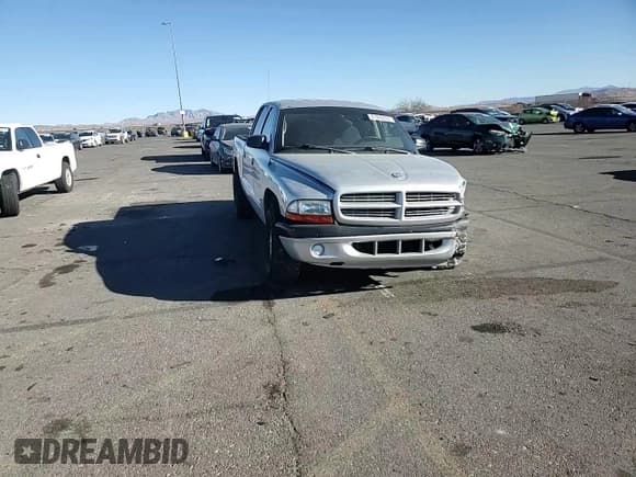 ✅ 2001 Dodge Dakota Sport • VIN: 1B7GL2AX71S162999 • Lot: 87095024. Wystawiony na Copart z przebiegiem 190 775 mil. Bezpłatny archiwum sprzedaży aukcyjnych z USA i szczegółowy raport historii pojazdu na DreamBid. Zdjęcie 10.