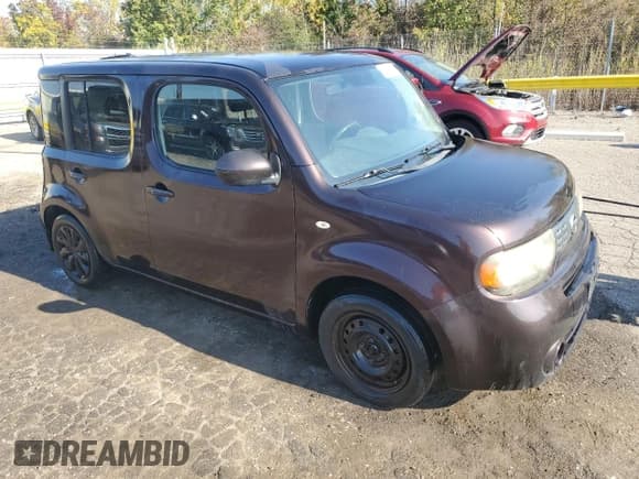 ✅ 2010 Nissan Cube S • VIN: JN8AZ2KR9AT156835 • Лот: 86615975. Опубликован ранее на Copart с пробегом 99 010 миль. Бесплатный доступ к архиву аукционных продаж из США и подробный отчёт об истории автомобиля на DreamBid. Изображение 4.