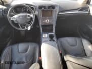 ✅ 2017 Ford Fusion Hybrid Titanium • VIN: 3FA6P0RU8HR113952 • Lot: 89856085. Wystawiony na Copart z przebiegiem Nie podano. Bezpłatny archiwum sprzedaży aukcyjnych z USA i szczegółowy raport historii pojazdu na DreamBid. Zdjęcie 8.