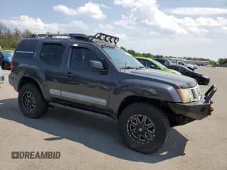 ✅ 2011 Nissan Xterra X • VIN: 5N1AN0NW6BC504861 • Lot: 63935215. Wystawiony na Copart z przebiegiem 103 204 mil. Bezpłatny archiwum sprzedaży aukcyjnych z USA i szczegółowy raport historii pojazdu na DreamBid. Zdjęcie 4.