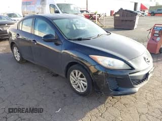 ✅ 2012 Mazda 3 i Touring • VIN: JM1BL1V85C1624623 • Lot: 43471644. Listed on IAAI with 203,309 mi. Free auction sales archive from the USA and detailed vehicle history report at DreamBid. Image 1.