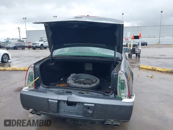 ✅ 2009 Cadillac DTS 1SA • VIN: 1G6KD57Y79U110350 • Lot: 42082318. Listed on IAAI with 94,369 mi. Free auction sales archive from the USA and detailed vehicle history report at DreamBid. Image 16.