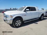✅ 2018 Ram 2500 Laramie • VIN: 3C6UR5NL2JG142720 • Lot: 62519285. Listed on Copart with 107,727 mi. Free auction sales archive from the USA and detailed vehicle history report at DreamBid. Image 1.