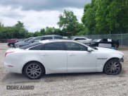 ✅ 2012 Jaguar XJ • VIN: SAJWA1CB8CLV29047 • Lot: 42434378. Listed on IAAI with 102,605 mi. Free auction sales archive from the USA and detailed vehicle history report at DreamBid. Image 14.