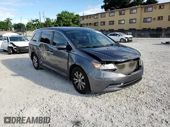 ✅ 2017 Honda Odyssey EX-L • VIN: 5FNRL5H64HB005302 • Lot: 85371305. Listed on Copart with 115,022 mi. Free auction sales archive from the USA and detailed vehicle history report at DreamBid. Image 14.