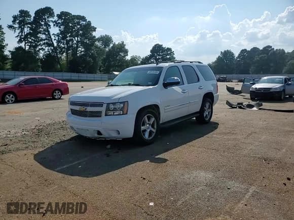 ✅ 2012 Chevrolet Tahoe LTZ • VIN: 1GNSCCE0XCR217010 • Lot: 80916105. Listed on Copart with 261,878 mi. Free auction sales archive from the USA and detailed vehicle history report at DreamBid. Image 14.