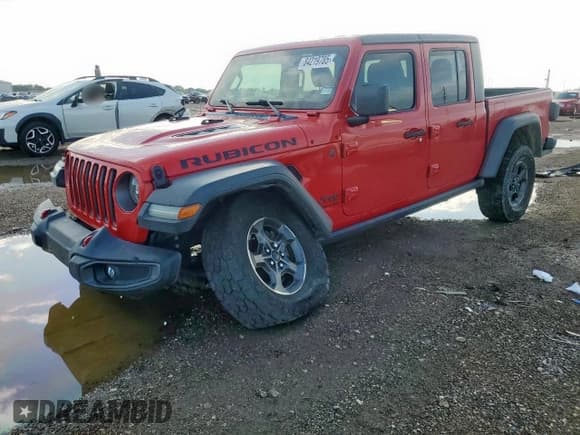 ✅ 2020 Jeep Gladiator Rubicon • VIN: 1C6JJTBG9LL162961 • Лот: 84219785. Опубликован ранее на Copart с пробегом Не указан. Бесплатный доступ к архиву аукционных продаж из США и подробный отчёт об истории автомобиля на DreamBid. Изображение 1.