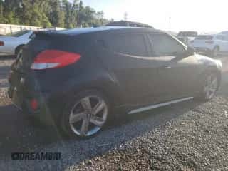 2013 Hyundai Veloster Turbo z VIN KMHTC6AE9DU139880, wystawiony jako Copart lot #67265384 z przebiegiem 148 383 mil mil oraz Szkoda całkowita • Salvage title. Historia ofert i sprzedaży dostępna na DreamBid. Obrazek 3.