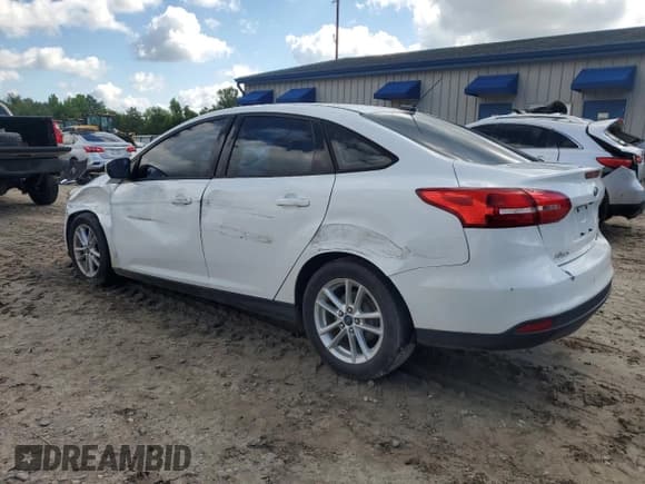 ✅ 2015 Ford Focus SE • VIN: 1FADP3F20FL342858 • Lot: 56569365. Listed on Copart with 94,211 mi. Free auction sales archive from the USA and detailed vehicle history report at DreamBid. Image 2.