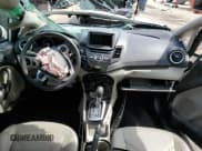 ✅ 2017 Ford Fiesta Titanium • VIN: 3FADP4CJ9HM139406 • Лот: 64456345. Опубликован ранее на Copart с пробегом Не указан. Бесплатный доступ к архиву аукционных продаж из США и подробный отчёт об истории автомобиля на DreamBid. Изображение 8.