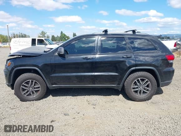 2017 Jeep Grand Cherokee Trailhawk with VIN 1C4RJFLT7HC754925, listed as a IAAI auction lot 43018651 with 118,604 mi miles and . Bid and sale history available at DreamBid. Image 14.